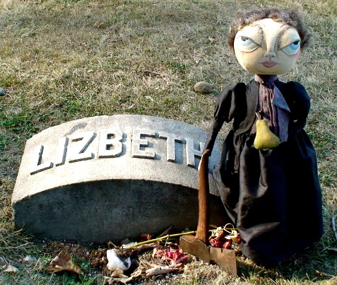 [Image: lizzy%20grave%20with%20doll.jpg]